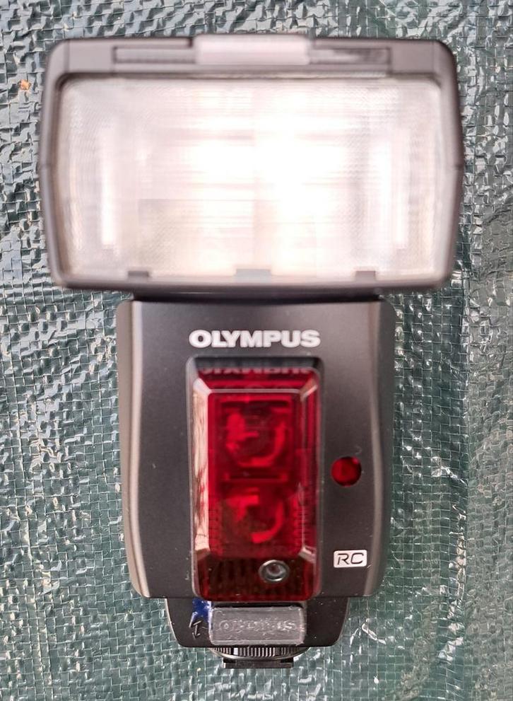 Olympus (OM) SLR elektronische flitser FS-FL50R, Audio, Tv en Foto, Fotografie | Flitsers, Zo goed als nieuw, Olympus, Kantelbaar
