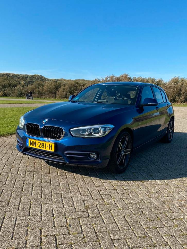 BMW 1-Serie 118i 136pk Aut 2017 Blauw, Auto's, BMW, Particulier, 1-Serie, Adaptieve lichten, Adaptive Cruise Control, Airbags