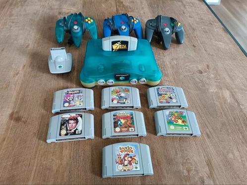 Ice Blue Nintendo 64 bundel met 8 spellen, Spelcomputers en Games, Spelcomputers | Nintendo 64, Gebruikt, Met 3 controllers of meer