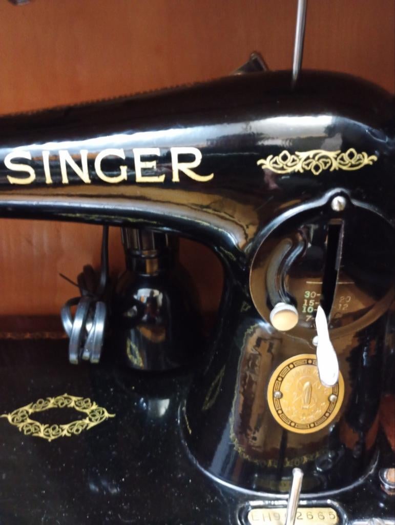 Mooie singer naaimachine, Ophalen