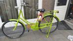 Nieuwe groene damesfiets, Ophalen