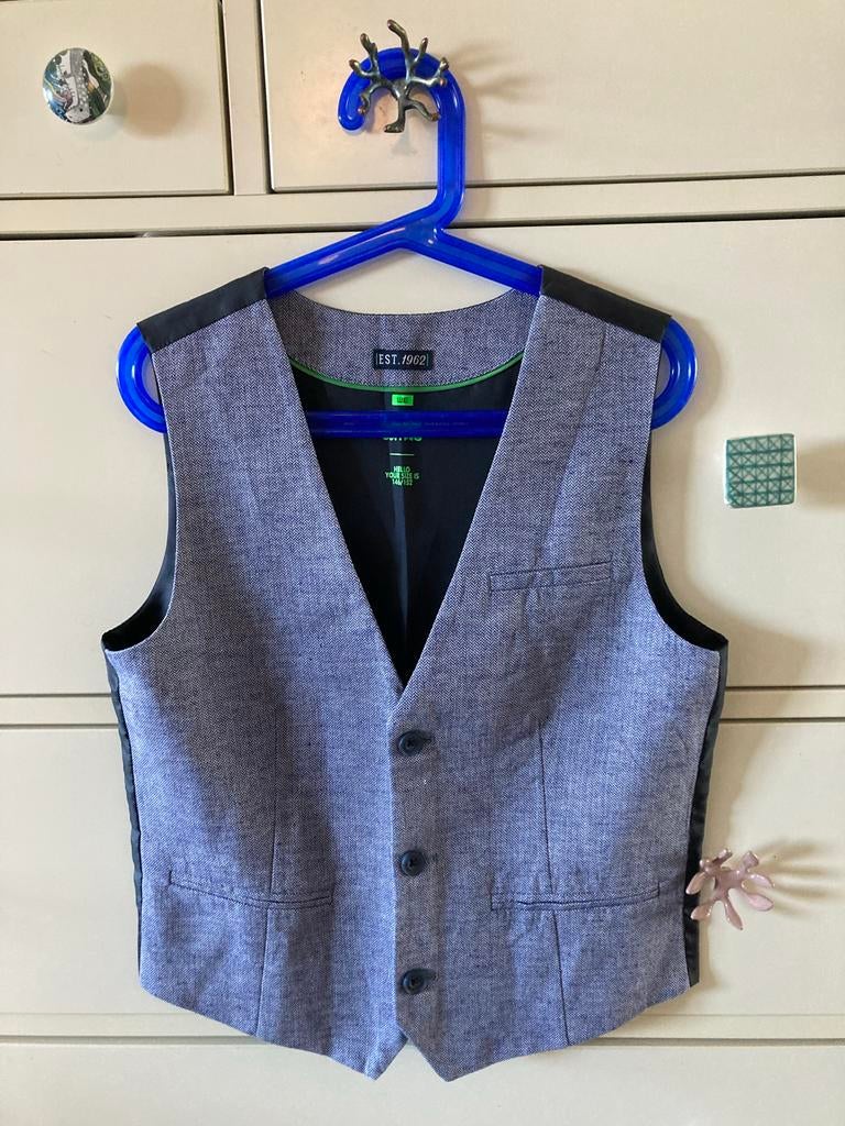 WE gilet lichtblauw maat 140, Ophalen, Gebruikt, Jongen, Trui of Vest