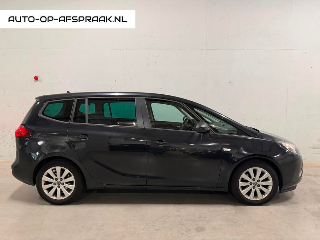Opel Zafira Tourer 1.4 Cosmo 7p. Navi Camera Cruise Airco Tr, Auto's, Opel, Stof, Gebruikt, Euro 6, 7 stoelen