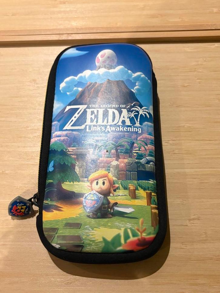 Nintendo Switch Lite Turquoise + Zelda Hoes & BOTW, Spelcomputers en Games, Spelcomputers | Nintendo Switch Lite, Zo goed als nieuw