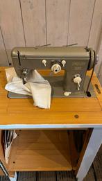 Pfaff 230 handbediende naaimachine in kast uit 1957, Ophalen
