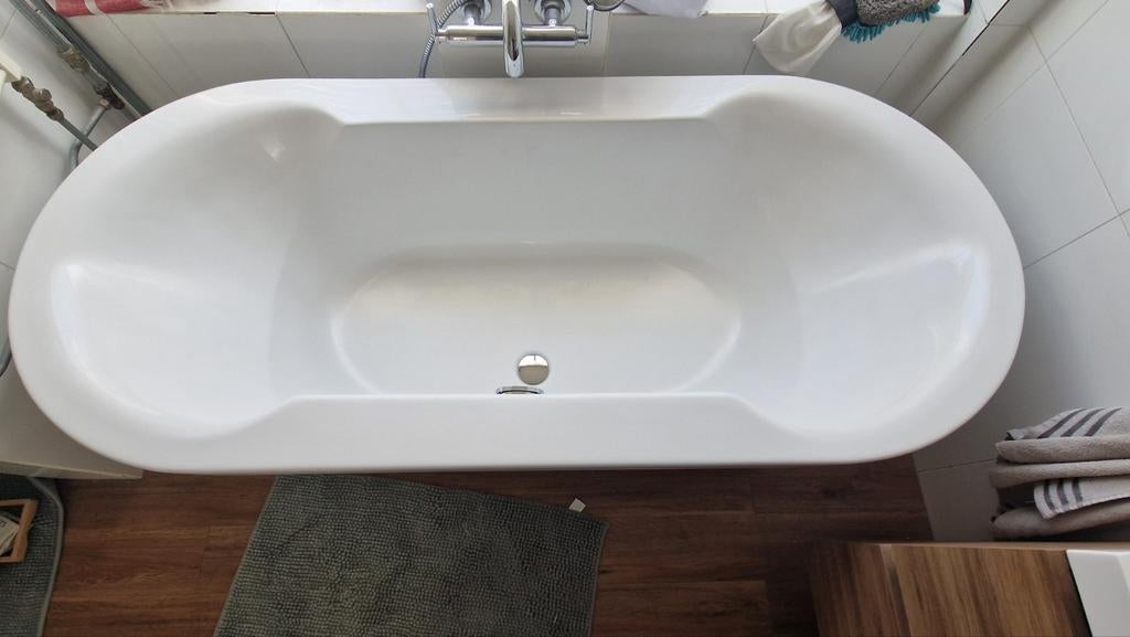 Vrijstaand kunststof bad, Ophalen