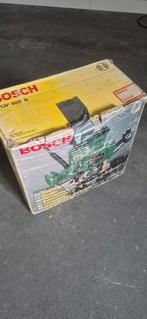 Bosch POF 400 A bovenfrees met accessoires, Ophalen