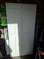 Louvre deur, Ophalen