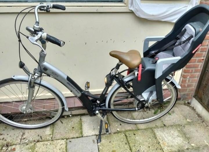Sparta fiets met kinderzitje - Ideaal voor jonge ouders, Fietsen en Brommers, Fietsaccessoires | Fietsstoeltjes, Gebruikt, Achterzitje