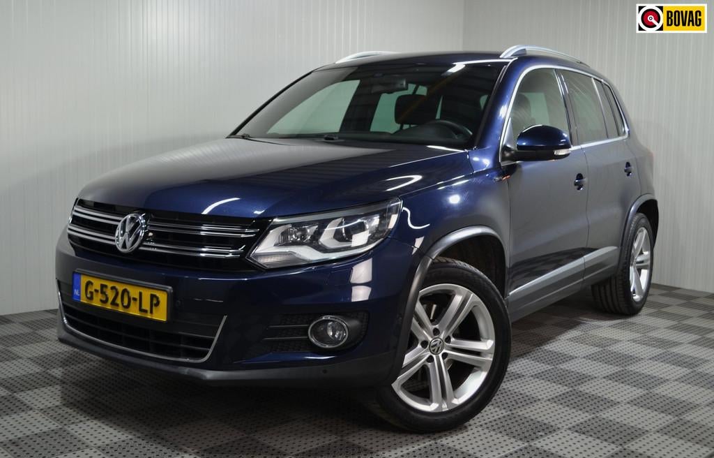 Volkswagen Tiguan 1.4 TSI R-Line Edition / Trekhaak / Camera, Auto's, Voorwielaandrijving, 4 cilinders, 150 pk, Blauw