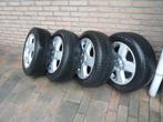 16inch velgen 5x110 met vredestein banden en opel wieldoppen, Ophalen, Gebruikt, Opel