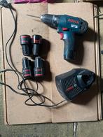 Bosh schroef/ boor machine. 4 extra batterijen., Doe-het-zelf en Verbouw, Gereedschap | Boormachines, Ophalen, Zo goed als nieuw
