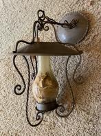 Smeedijzeren lamp, Ophalen