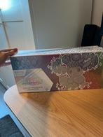 Prismatic Evolutions Super Premium Collection, Hobby en Vrije tijd, Verzamelkaartspellen | Pokémon, Ophalen of Verzenden, Zo goed als nieuw