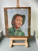 Vintage schilderij op hout. Vrouw met groene regenkleding., Ophalen