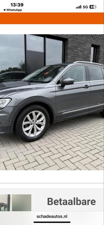Zijscherm links en een wielkap van Volkswagen Tiguan SUV beschikbaar voor biedingen