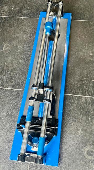 Tegelsnijder 600mm. Slechts 1 maal gebruikt beschikbaar voor biedingen