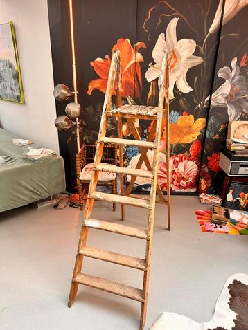 Vintage oude schilderstrap beschikbaar voor biedingen
