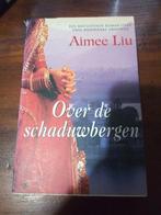 Aimee E. Liu - Over de schaduwbergen, Aimee E. Liu, Zo goed als nieuw, Nederland, Verzenden