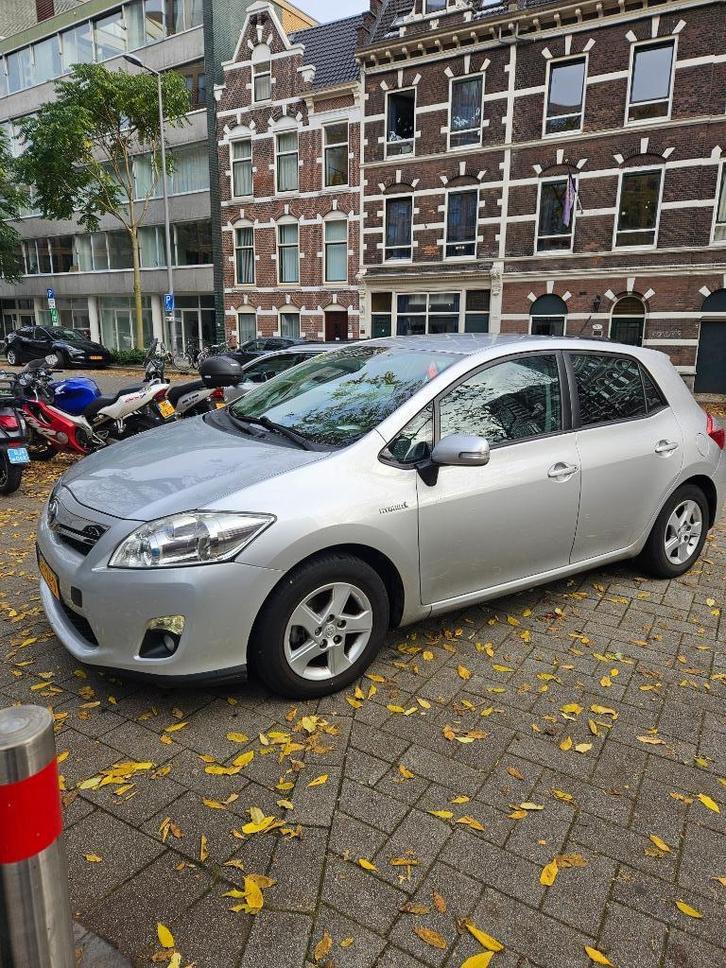 Toyota Auris 1.8 Full Hybrid Automaat 2011 Aspiration Grijs, Auto's, Toyota, Particulier, Auris, Hybride Elektrisch/Benzine, Volledig hybride