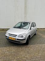 Hyundai Getz 1.3 5DRS 2003 Grijs, Auto's, Voorwielaandrijving, 40 €/maand, 4 cilinders, Origineel Nederlands