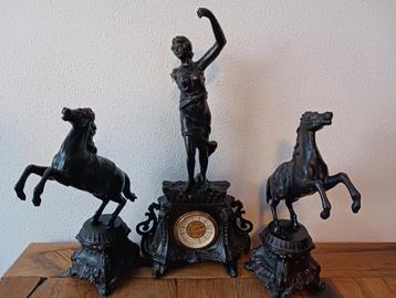 Antiek brons klokkenstel  beschikbaar voor biedingen