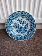 Delfs blauw bord, Ophalen