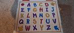 Houten alfabet, Ophalen