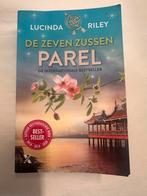 De Zeven Zussen - Parel, Lucinda Riley, Boeken, Romans, Ophalen of Verzenden, Zo goed als nieuw, Nederland