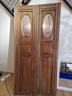 houten deurtjes met geslepen spiegels, Ophalen