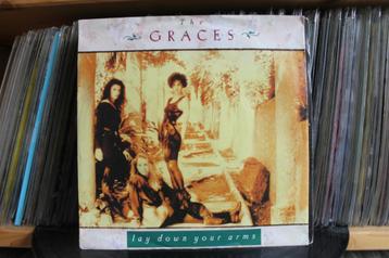 7" Single Graces - Lay Down Your Arms / Out In The Fields beschikbaar voor biedingen