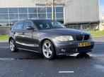 BMW 1-serie 116i High Executive LEER AIRCO CRUISE NAP, Auto's, Zwart, 4 cilinders, 635 kg, 116 pk