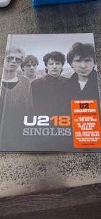 U2 18 singles cd dvd, Alle leeftijden, Ophalen of Verzenden, Nieuw in verpakking
