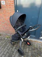 Stokke kinderwagen, Ophalen