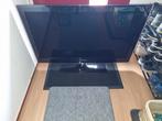 Samsung tv met afstandsbediening., Ophalen