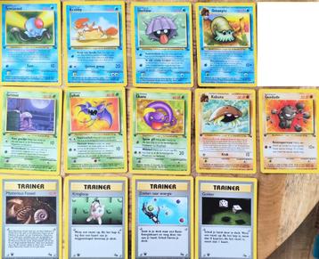 Set van 13 Nederlandse Fossil 1e editie Pokemonkaarten beschikbaar voor biedingen