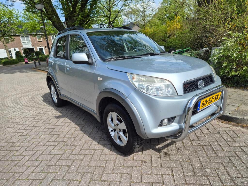 Daihatsu Terios 1.5 4WD 2006 Grijs, Auto's, Daihatsu, Elektrische ramen, 1350 kg, Stof, 1165 kg