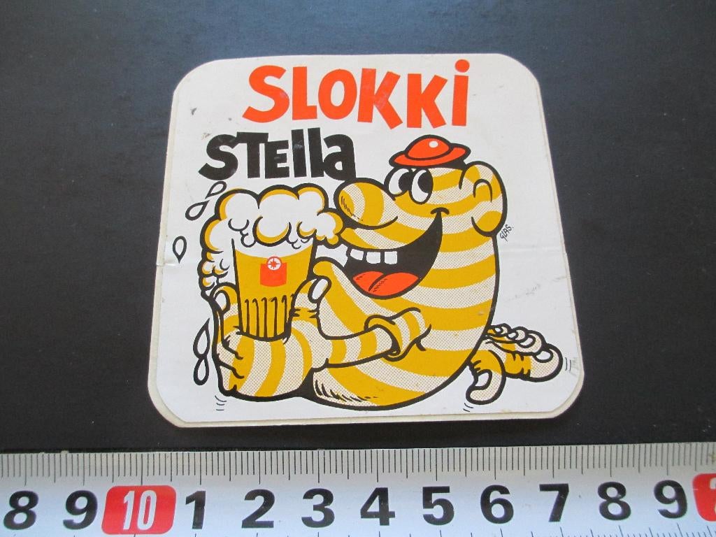 sticker bier slokki stella artois strip, Ophalen, Zo goed als nieuw