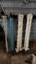 Rantsoenpaaltjes en stroomdraadhaspel