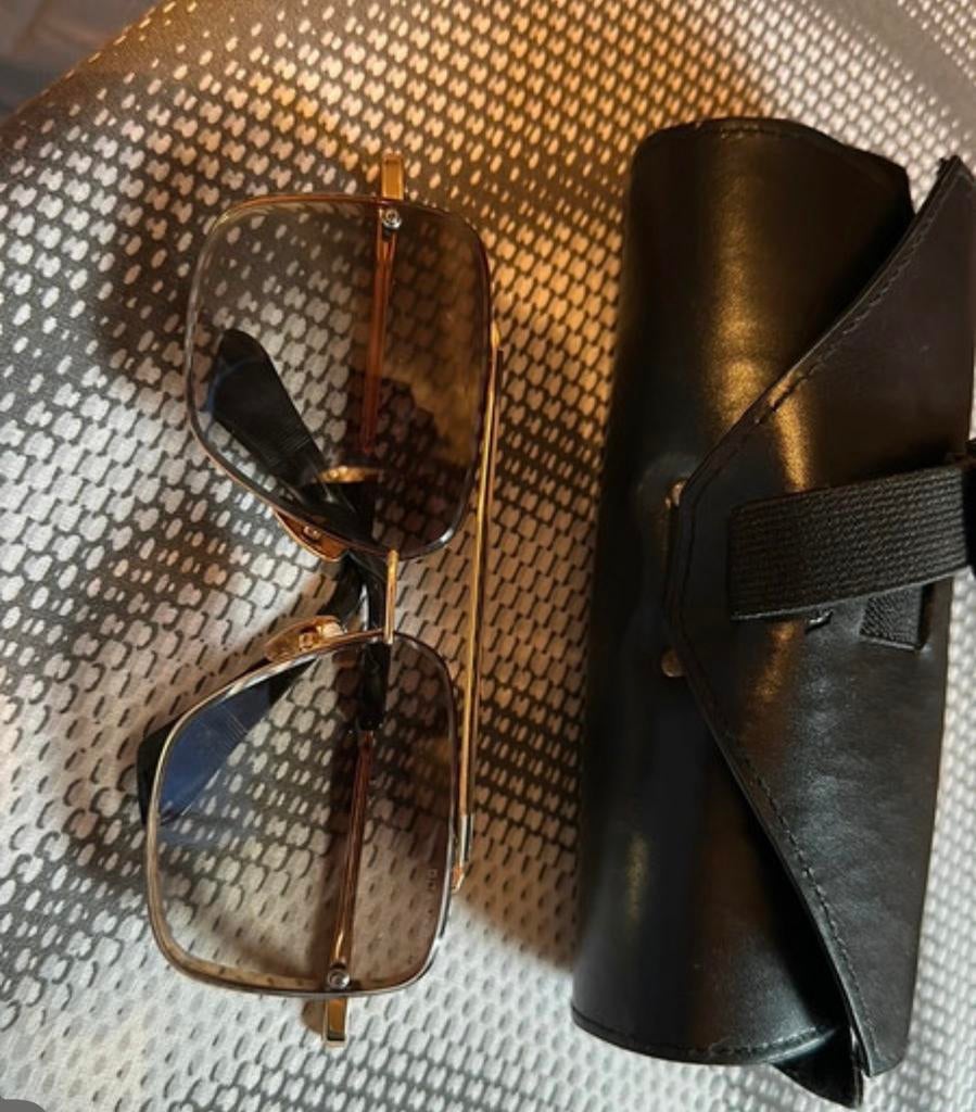 Stijlvolle Zonnebril met Gouden Montuur en Hoesje, Sieraden, Tassen en Uiterlijk, Zonnebrillen en Brillen | Dames, Overige merken