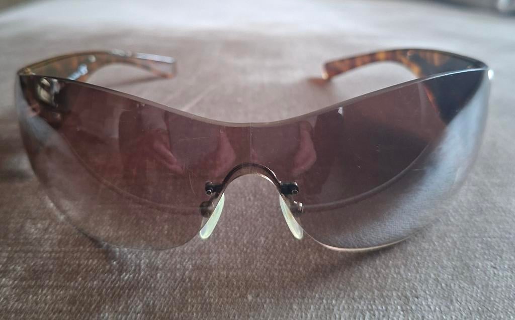 Prada Heren Zonnebril Exclusief One Shield Bruin IZGS, Ophalen of Verzenden, Zo goed als nieuw, Bruin, Overige merken