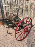 Oldtimer vorkjes schudder, oude antieke hooischudder, Ophalen