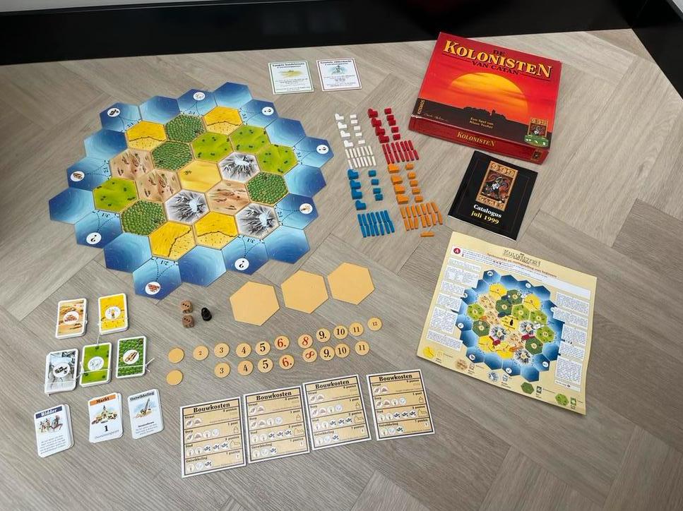 De Kolonisten van Catan met houten huisjes., Ophalen of Verzenden, Gebruikt
