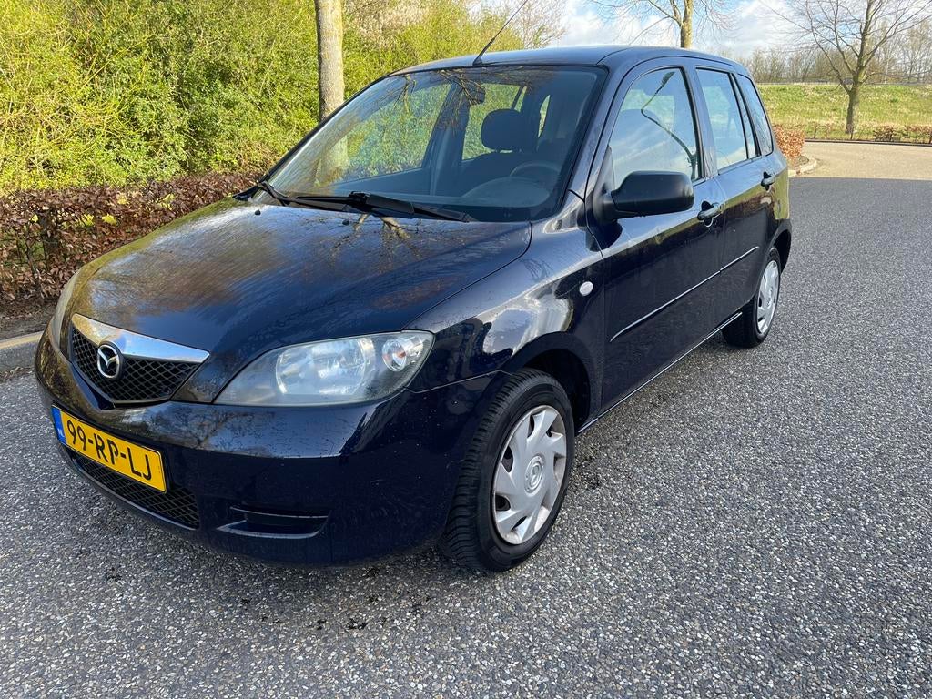 Mazda 2 1.4 16V AUT 2005 Volle Tank Airco Apk NAP Lage km, Auto's, Mazda, 15 km/l, 40 €/maand, 4 cilinders, Blauw