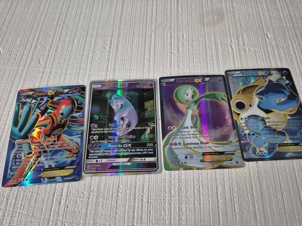 4 zeldzame en waardevolle Pokémon kaarten (GX/EX), Ophalen of Verzenden, Gebruikt, Meerdere kaarten, Foil