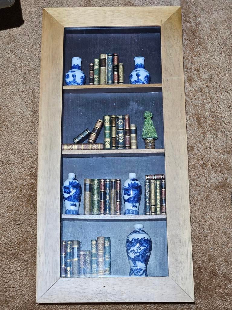 3D Schilderij Boekenkast met vaasjes en boekjes, Ophalen