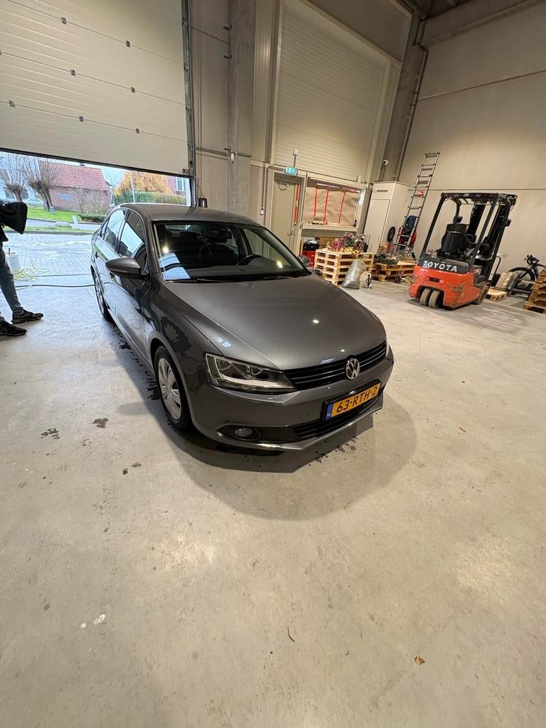 Volkswagen Jetta 1.2TSI 77KW H6 2011 Grijs, Voorwielaandrijving, 4 cilinders, Origineel Nederlands, 1200 kg