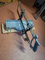 Kinzo verstekzaag, Ophalen