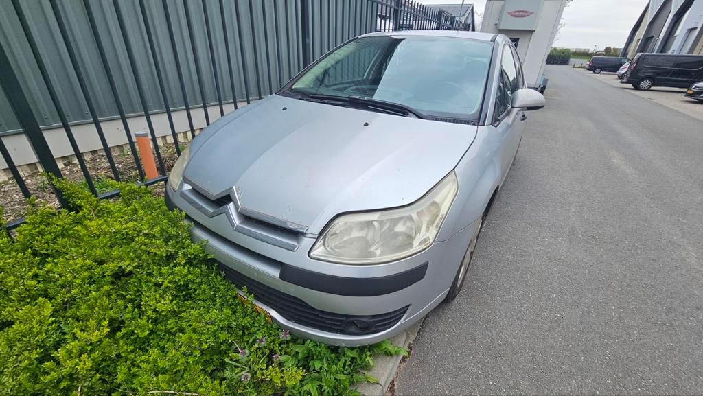 Citroën C4 1.4 16V Berline 2005 Grijs, Auto's, Voorwielaandrijving, 1360 cc, 4 cilinders, Origineel Nederlands