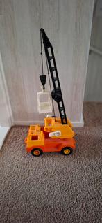De Onverwoestbare kraan van Fisher Price met grijper., Ophalen